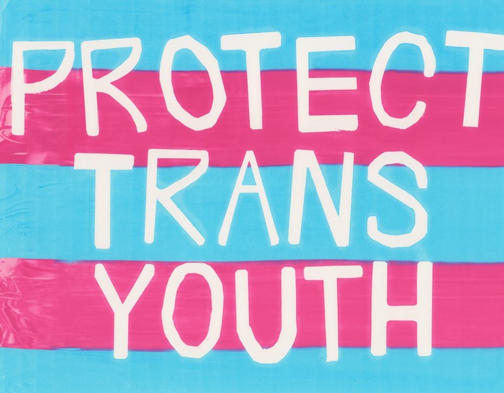 A poster that says protect trans youth